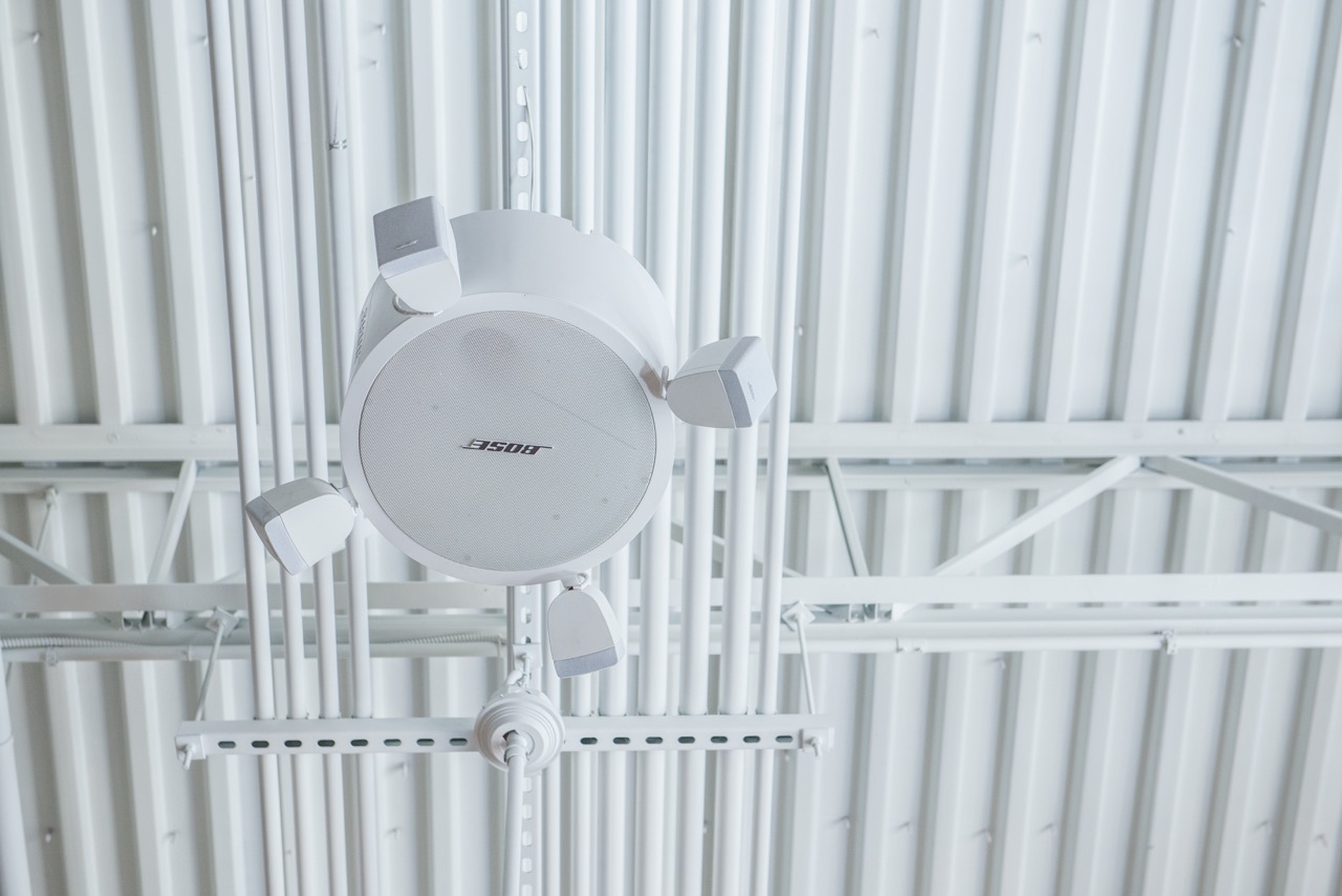 Installed ceiling audio system in a commercial space